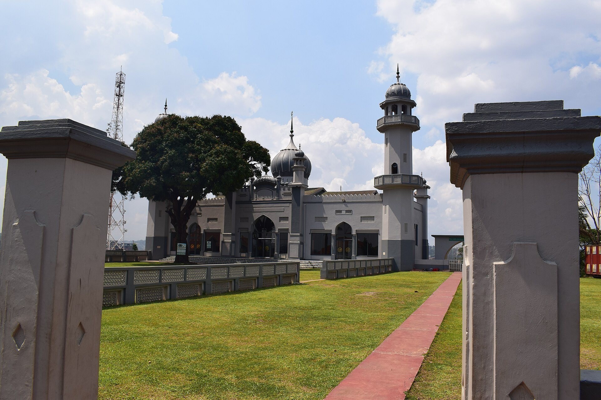 Kibuli Mosque seen from its gateway across the lawn, 2020